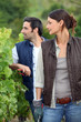 Farming couple in field