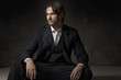 Fashionable man sitting