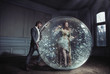 Photo: A young lady got stuck in crystal ball A young lady got stuck in crystal ball