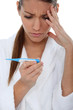 Young brunette with pregnancy test