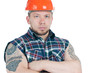 Foto: Confident tattooed building contractor with his arms crossed Confident tattooed building contractor with his arms crossed