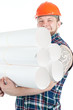 Foto: Smiling manual worker holding a heap of blueprints rolls Smiling manual worker holding a heap of blueprints rolls