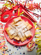 carnival fritters on red dish carnival fritters on red dish