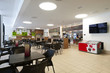 Photo: large self service restaurant with wood and rattan interior large self service restaurant with wood and rattan interior