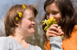 A girl with Down syndrome and her sister.