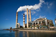 Industrial power plant with smokestack