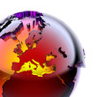 Globe of colored glass with an inner warm glow