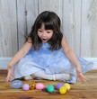 Photo: sweet little girl excited over easter eggs sweet little girl excited over easter eggs
