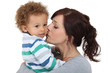 Mother kissing her little boy