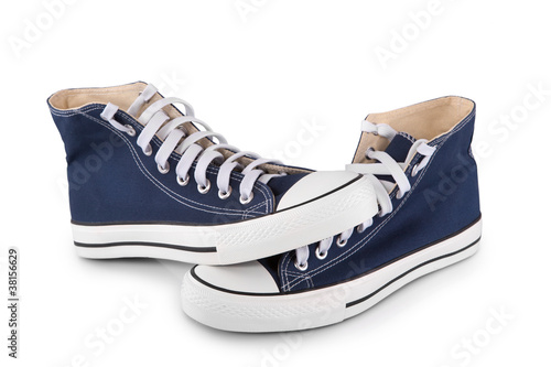 Foto: Pair of new blue sneakers on white background Pair of new blue sneakers on white background