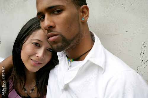 Photo: Serious young urban couple Serious young urban couple
