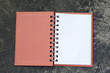 open brown book on Concrete