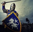 Medieval knight against hill full of crosses.