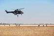 Foto: Helicopter and soldiers in action Helicopter and soldiers in action