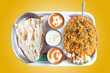 Indian biryani, butter naan with spicy curry