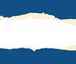 A blue sheet of paper is teared in two