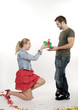 A girl gives her boyfriend gift A girl gives her boyfriend gift