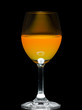 Orange juice in wine glass