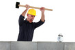 Tradesman about to smash an alarm clock