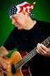 man with a guitar, bass player