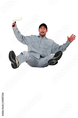 Photo: Shocked painter falling backwards Shocked painter falling backwards