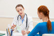 Photo: Doctor advises woman patient Doctor advises woman patient