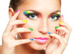 Woman face with rainbow makeup