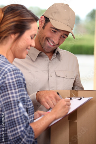 Photo: Man delivering parcel Man delivering parcel