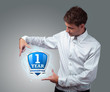 businessman holding virtual shield sign businessman holding virtual shield sign