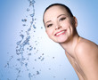 Happy girl with splashes of water