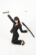 asian businesswoman with japanese sword