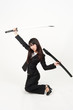 asian businesswoman with japanese sword