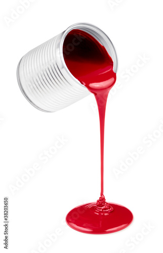 Photo: Red liquid paints spouting from can isolated Red liquid paints spouting from can isolated