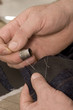 detail of sewing hand detail of sewing hand