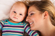 Mother with happy and cute infant baby girl