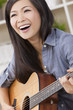 Beautiful Happy Chinese Oriental Asian Woman Smiling & Guitar