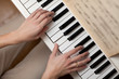 Photo: Playing Piano (shallow DOF; color toned image) Playing Piano (shallow DOF; color toned image)