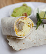 Breakfast burrito, in mexican style,with guacamole