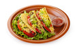 beef tacos with salad and tomatoes salsa