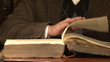 Video: The man flips through an old book The man flips through an old book