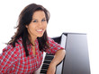 teenage girl leaning on the piano