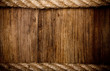 Photo: rope on weathered wood background rope on weathered wood background