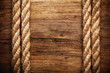 Photo: rope on weathered wood background rope on weathered wood background