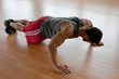 Muscular man doing push-ups