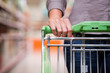 Photo: Woman Shopping at Supermarket with Trolley Woman Shopping at Supermarket with Trolley