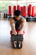 Muscular man stretching