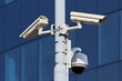Photo: three cctv security cameras on street pylon three cctv security cameras on street pylon
