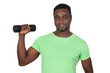 Attractive african man lifting weights