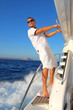 Sailor relaxing happily on the vacation sailboat yacht Sailor relaxing happily on the vacation sailboat yacht