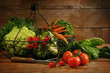 Freshly picked vegetables in basket on table